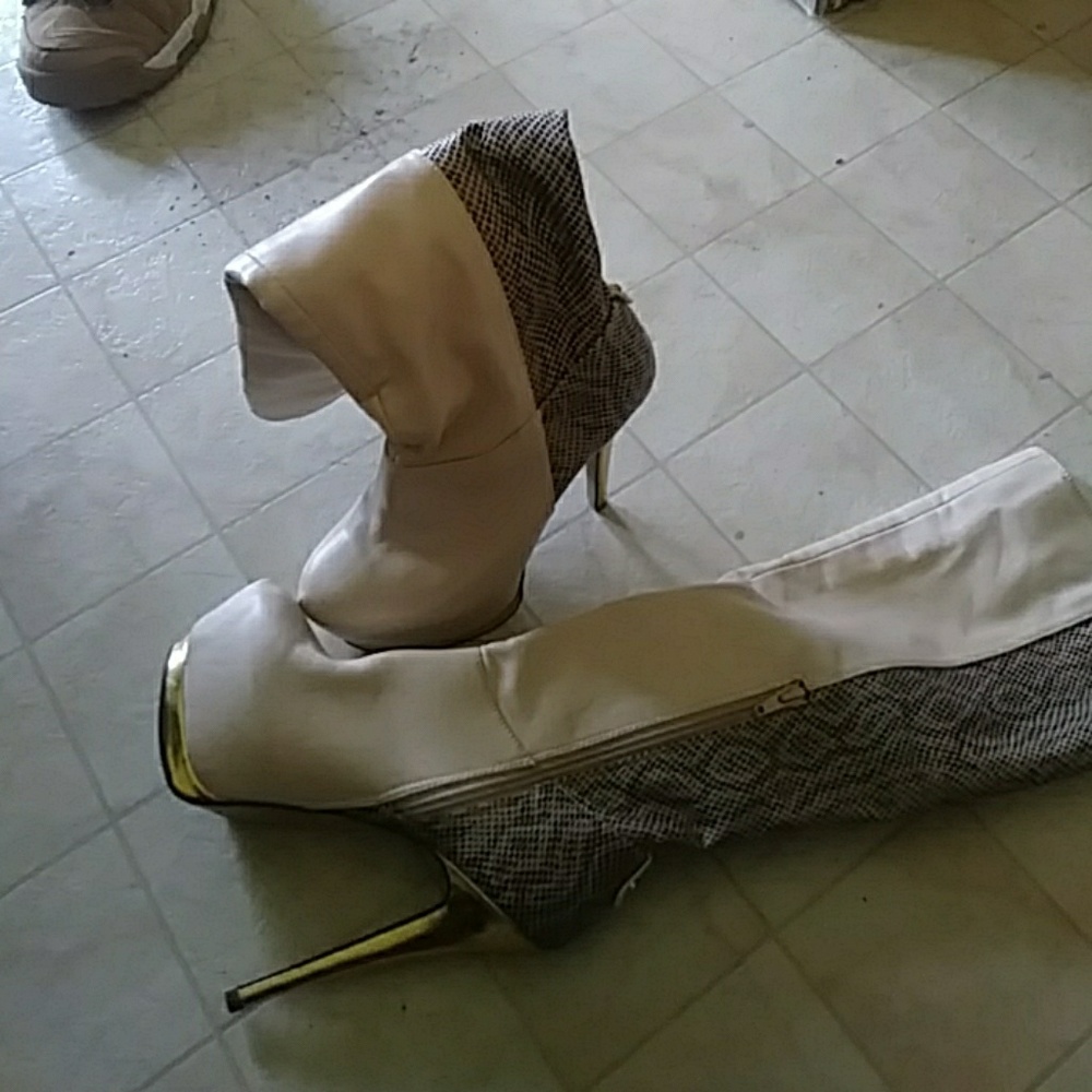A pair of five and a half knee high boots